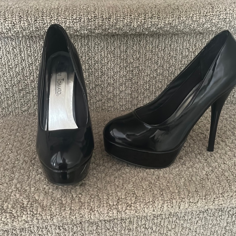 Slightly worn black stiletto heels
